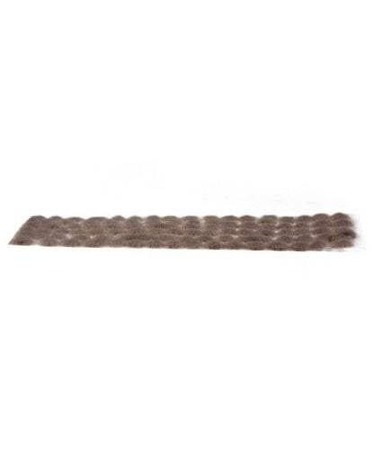A brown textured strip composed of numerous small, soft, rounded tufts arranged in rows, on a white background