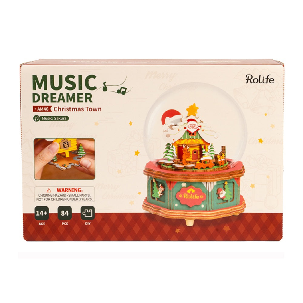 Rolife Music Dreamer Christmas Town DIY music box kit showing Santa snow globe