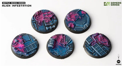Five 'Alien Infestation' miniature bases: round, blue sci-fi terrain with vibrant pink organic alien growth.