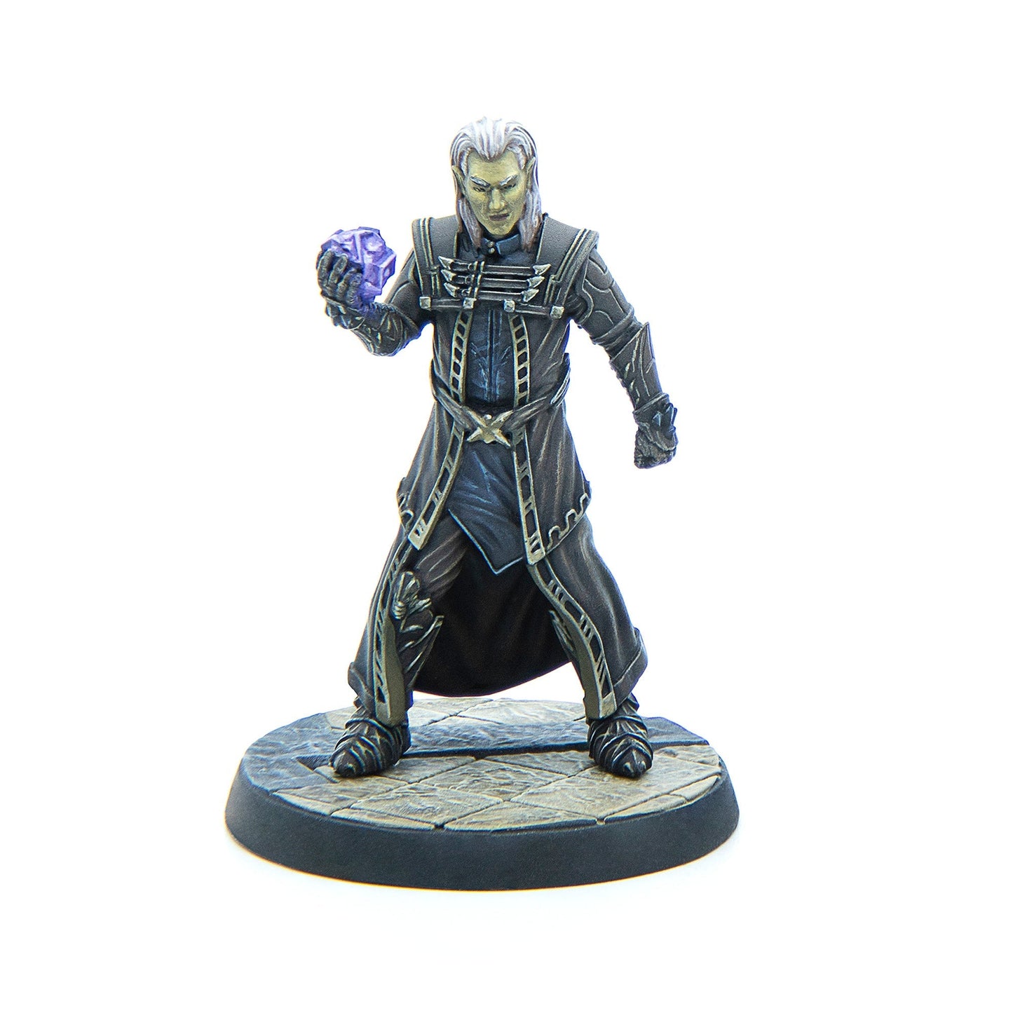 A fantasy elf wizard miniature with pale skin and white hair, wearing dark robes, holding a glowing purple crystal