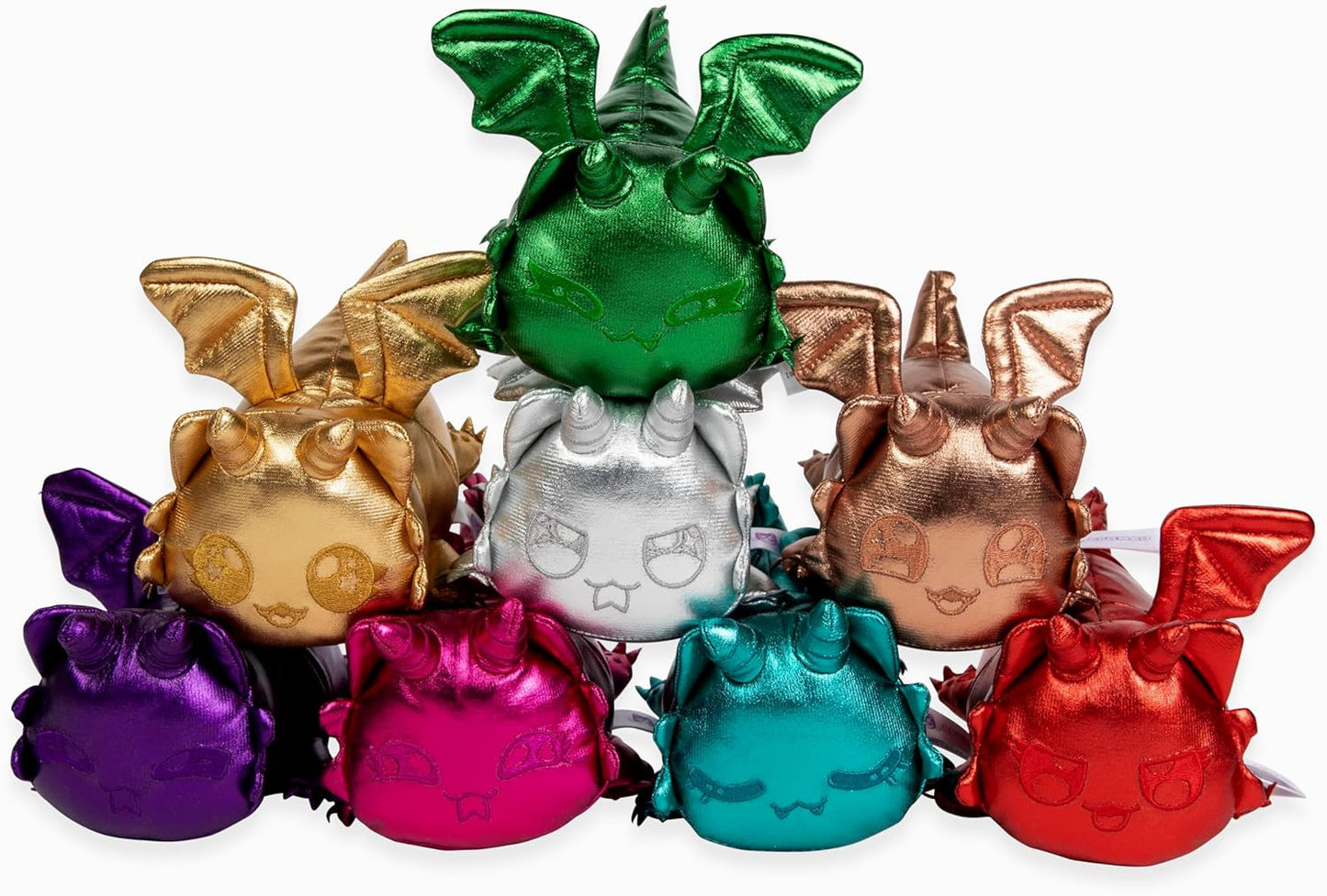 A cluster of colorful, shiny plush dragon toys with wings and horns, including green, gold, silver, and red