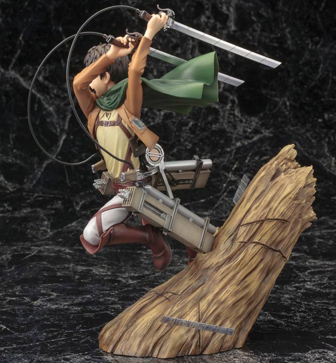 Side view of Eren Yeager anime figure launching from a tree stump, wielding dual swords and ODM gear on dark background