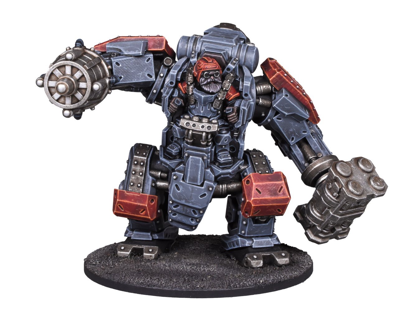 A grey and red armored mech miniature, piloted by a visible bearded figure, holding distinct combat weapons