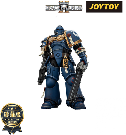Warhammer Space Marine figure (Ultramarines blue armor) holding a bolter and chainsword