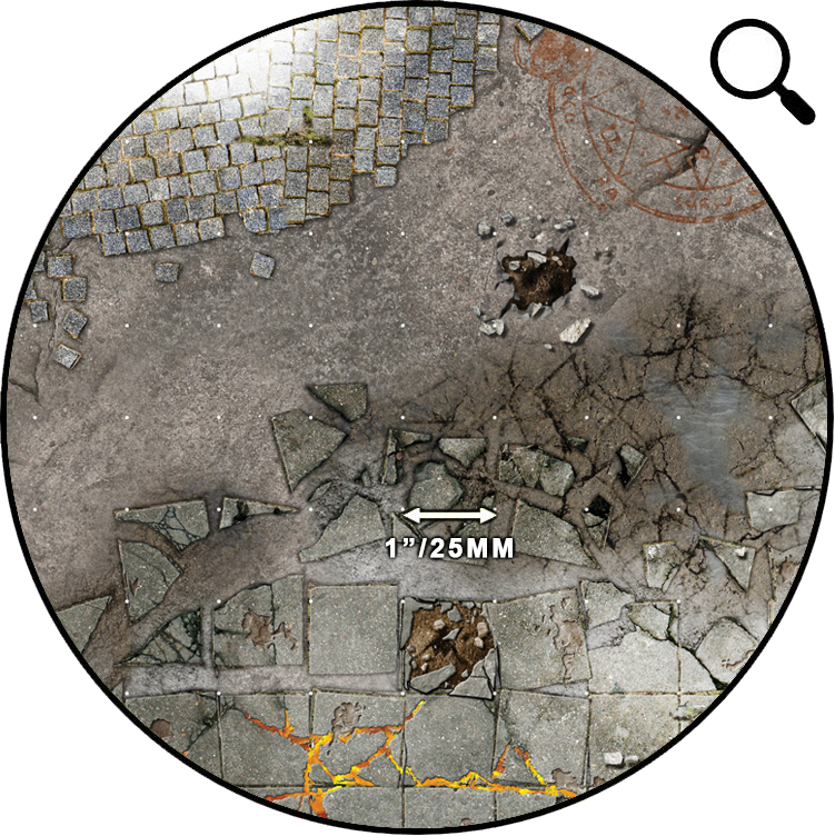 Circular close-up of a game map: cracked street, glowing lava cracks, a hole, and a 1"/25mm scale.