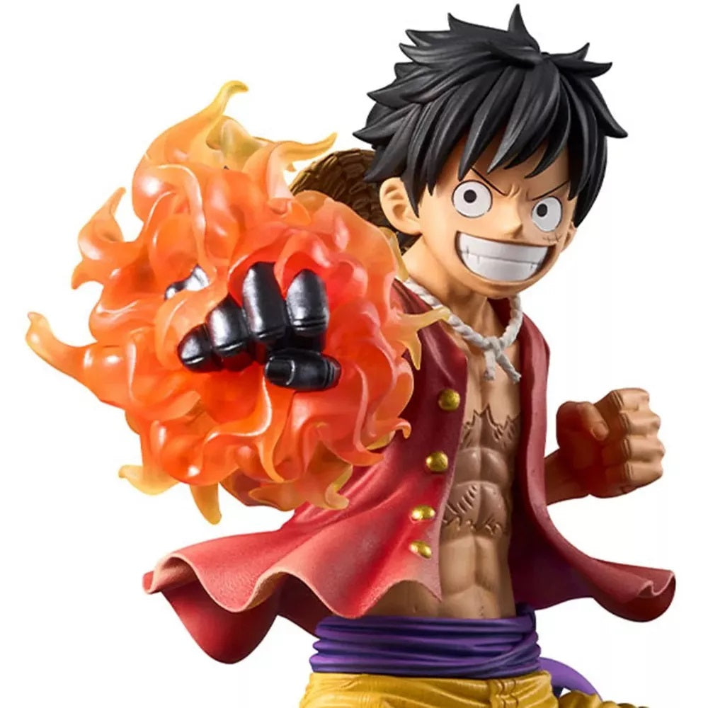 Luffy action figure with a fiery orange punch effect (Red Hawk) and a wide grin