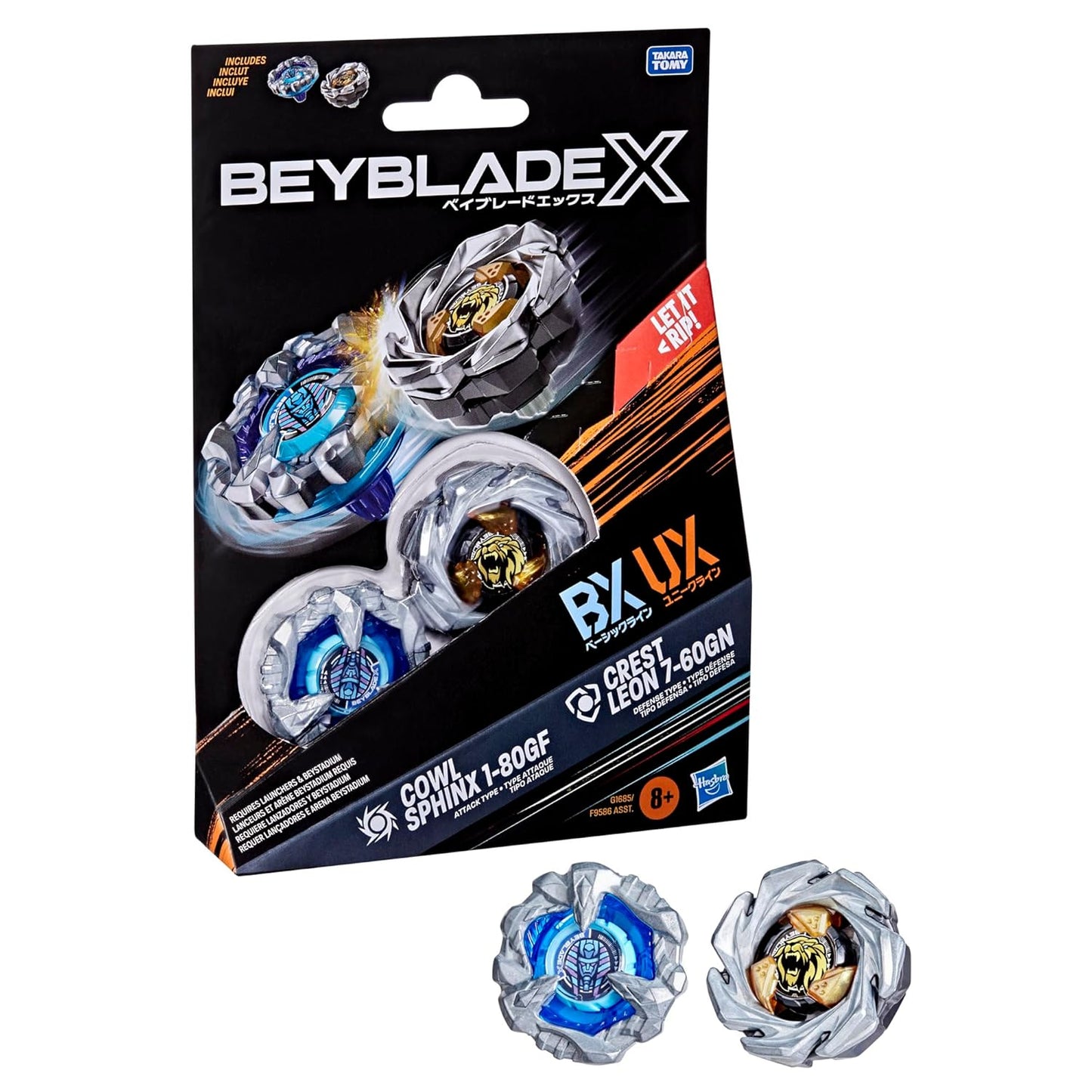 Beyblade X package shows two spinning tops: blue/silver (robot) and gold/silver (lion). Two actual tops below