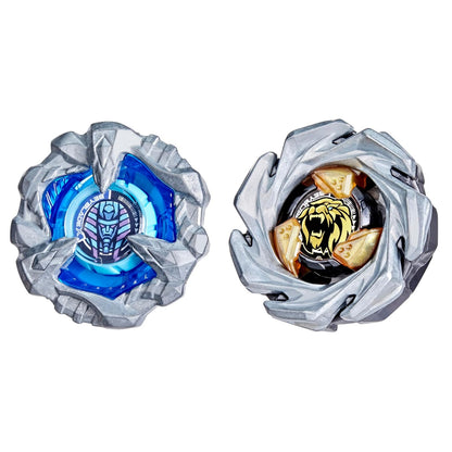 Two Beyblade spinning tops with metallic gray shells. One has a blue pharaoh, the other a gold tiger