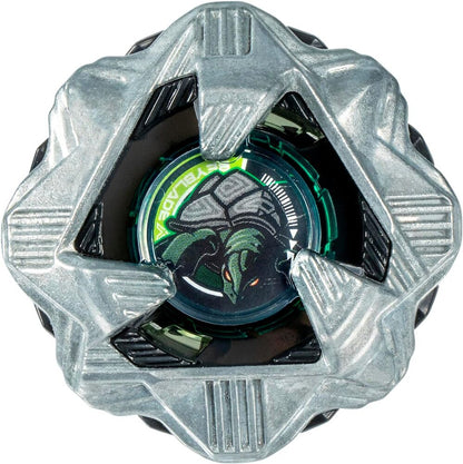 A silver and black Beyblade with a green and black aggressive turtle head emblem at its center