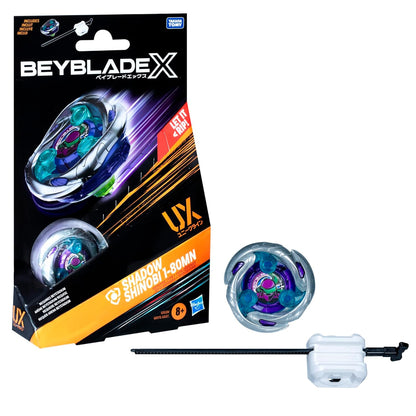 Beyblade X Shadow Shinobi toy set: a silver, purple, blue spinning top, white launcher with ripcord and its black product box
