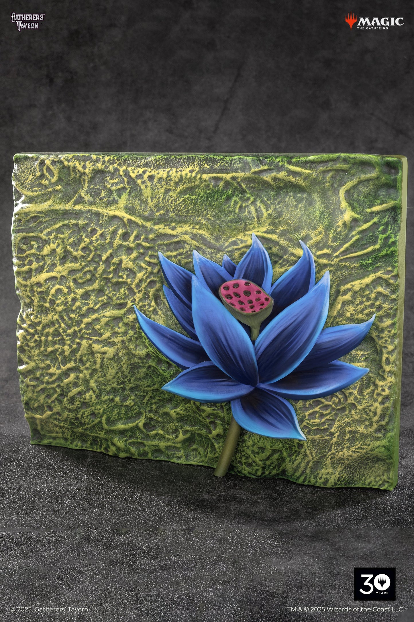 Embossed blue lotus with pink seed pod on a textured green plaque