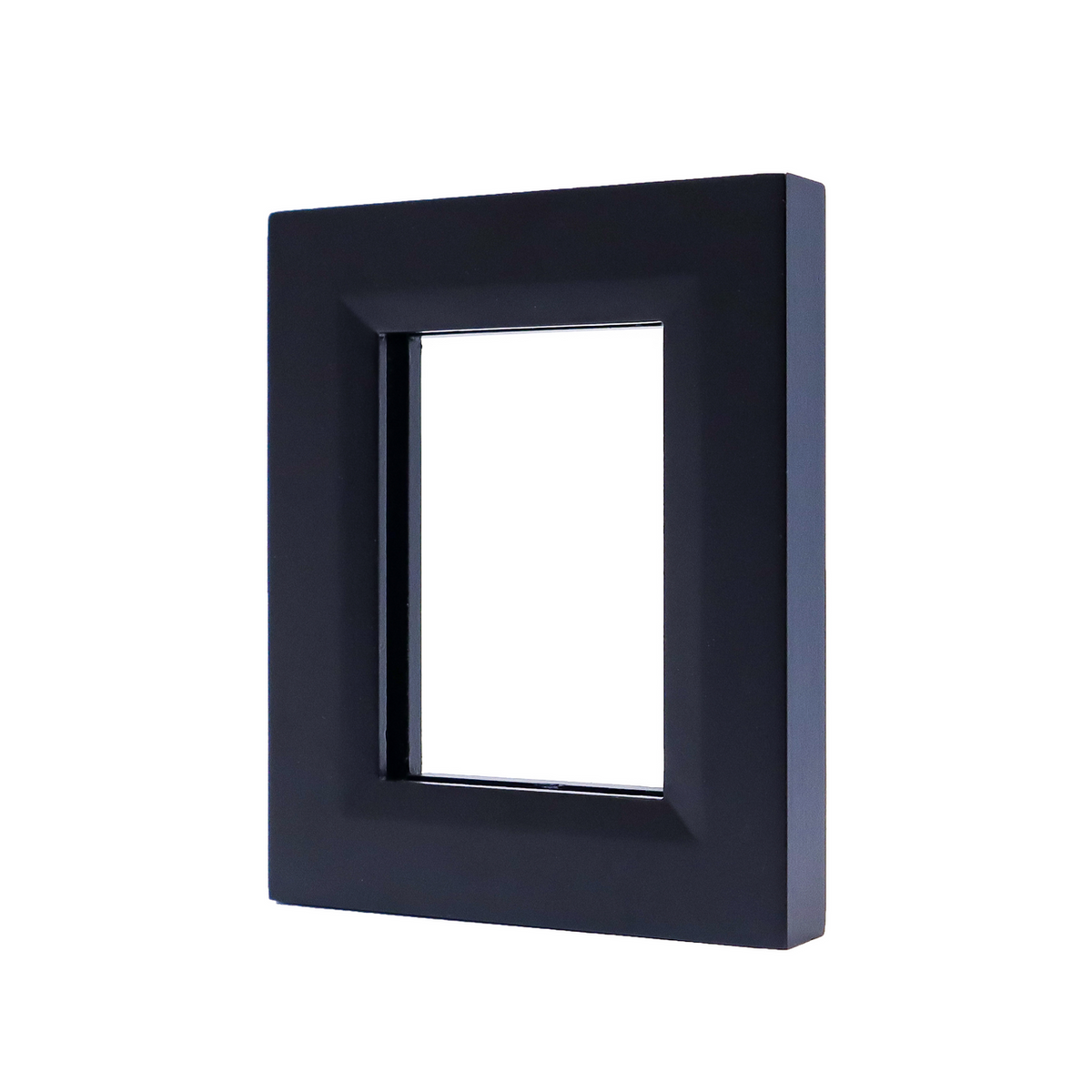 A black rectangular frame with a beveled inner edge, angled against a white background