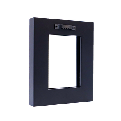 Back of a black rectangular picture frame with a metal sawtooth hanger attached at the top