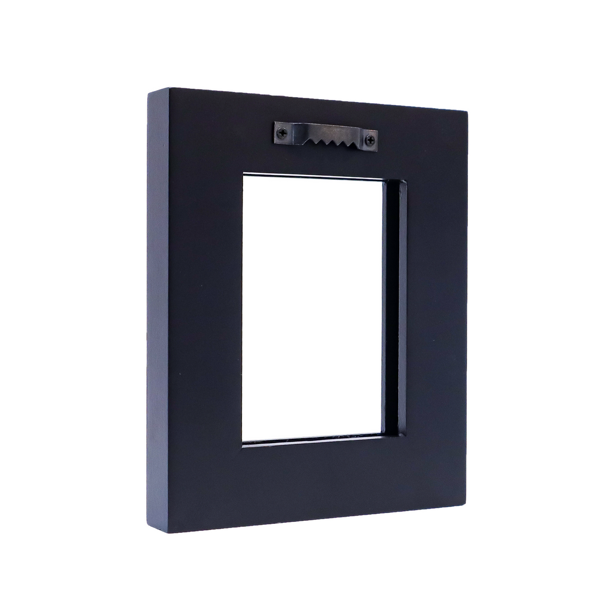 Back of a black rectangular picture frame with a metal sawtooth hanger attached at the top