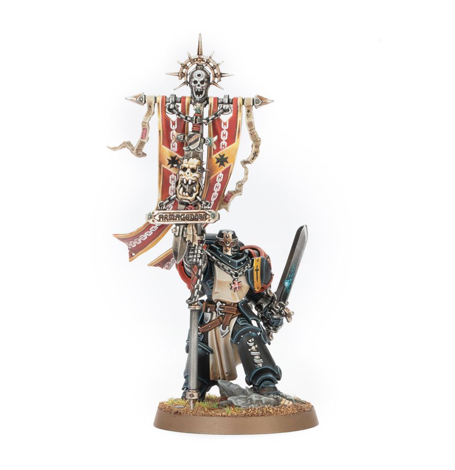 Black Templar Space Marine miniature in black & white power armour, holding a tall skull-topped banner with 'ARMAGEDDON' and a glowing power sword
