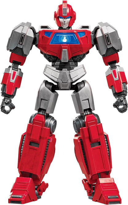 A red and gray robot stands facing forward, with a glowing blue chest screen displaying a white symbol