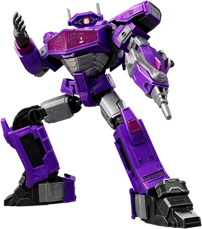 Purple Decepticon Shockwave with a single eye and arm cannon stands in a dynamic pose, left arm raised