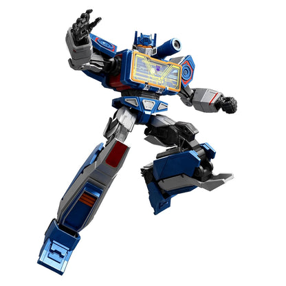 Blue and gray Soundwave Transformer robot lunging forward with one hand raised and a Decepticon logo on its cassette player chest
