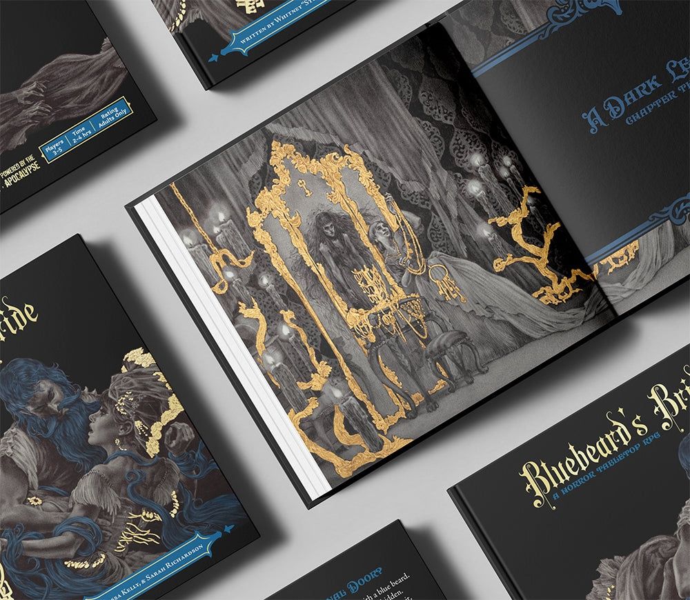 Several 'Bluebeard's Bride' horror RPG books, black with gold details, One open to a golden-framed gothic illustration