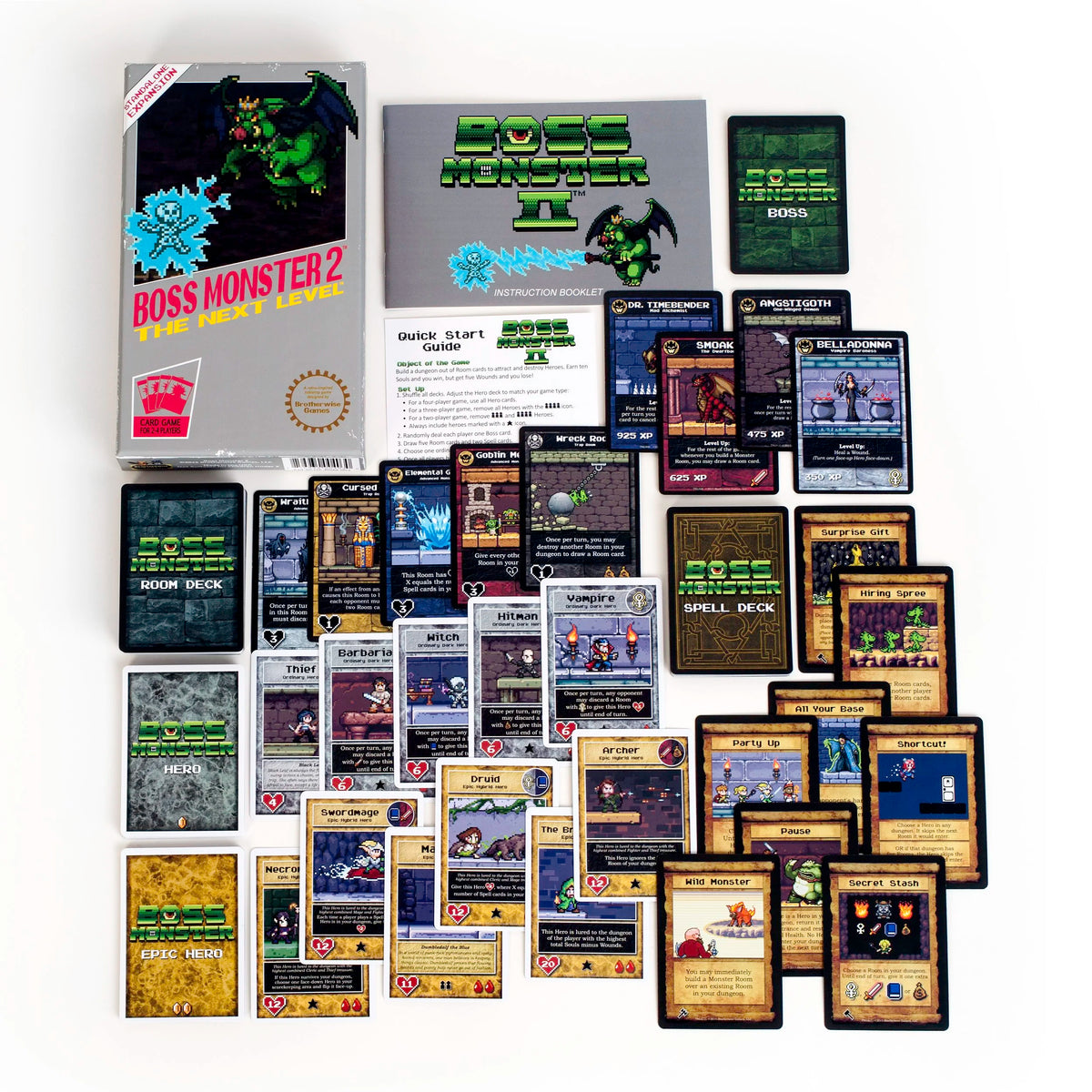 The Boss Monster The Next Level board game components are splayed out, including the box, rulebooks, and numerous pixel-art game cards