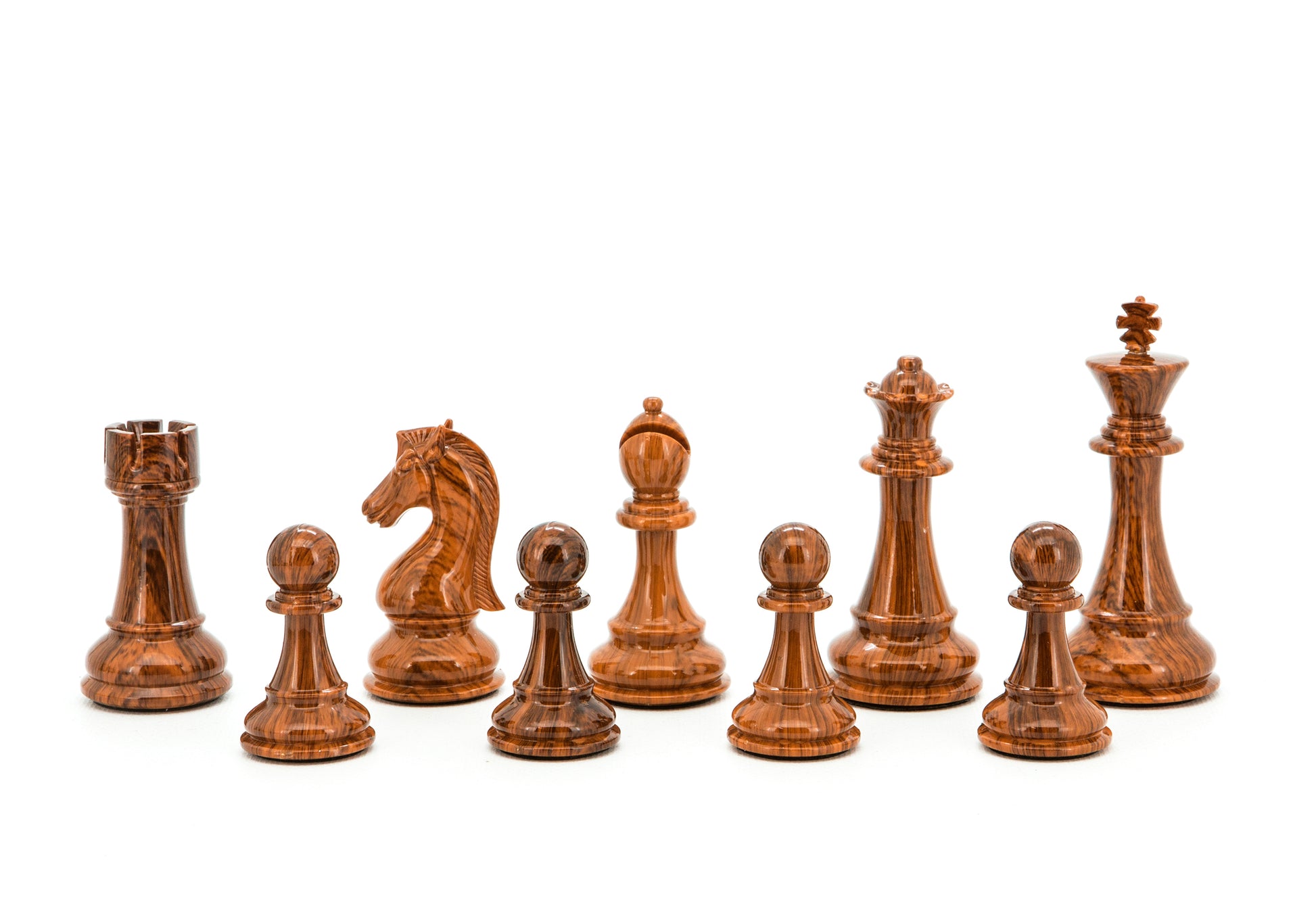 Dark wood-grained chess pieces: King, Queen, Rook, Knight, Bishop, and four pawns, arranged on a white background