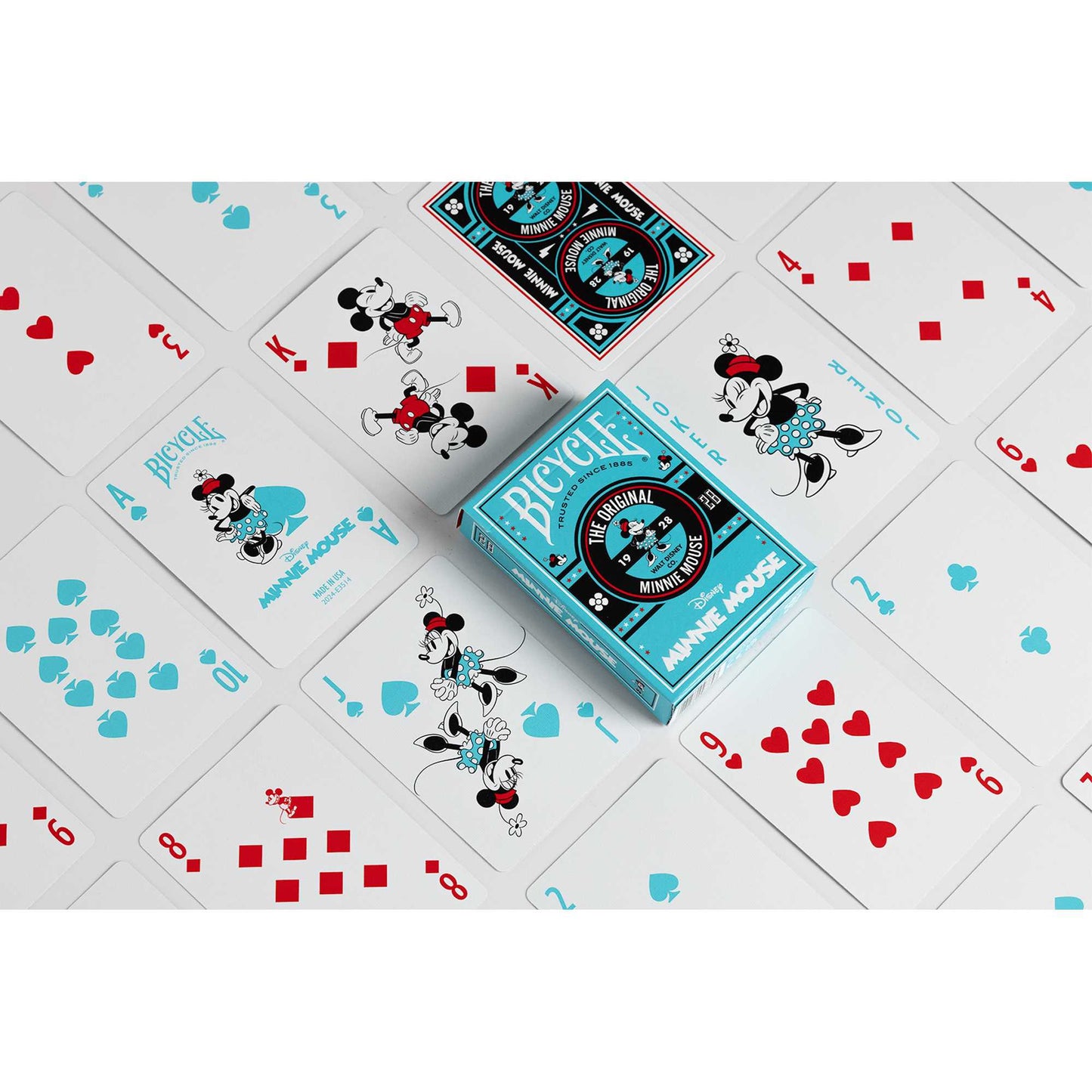 Minnie Mouse Disney Bicycle playing cards and turquoise deck box, displayed scattered