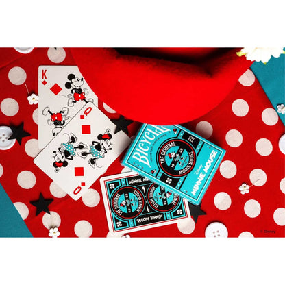 Bicycle Disney Minnie Mouse playing cards and box on a red polka dot surface