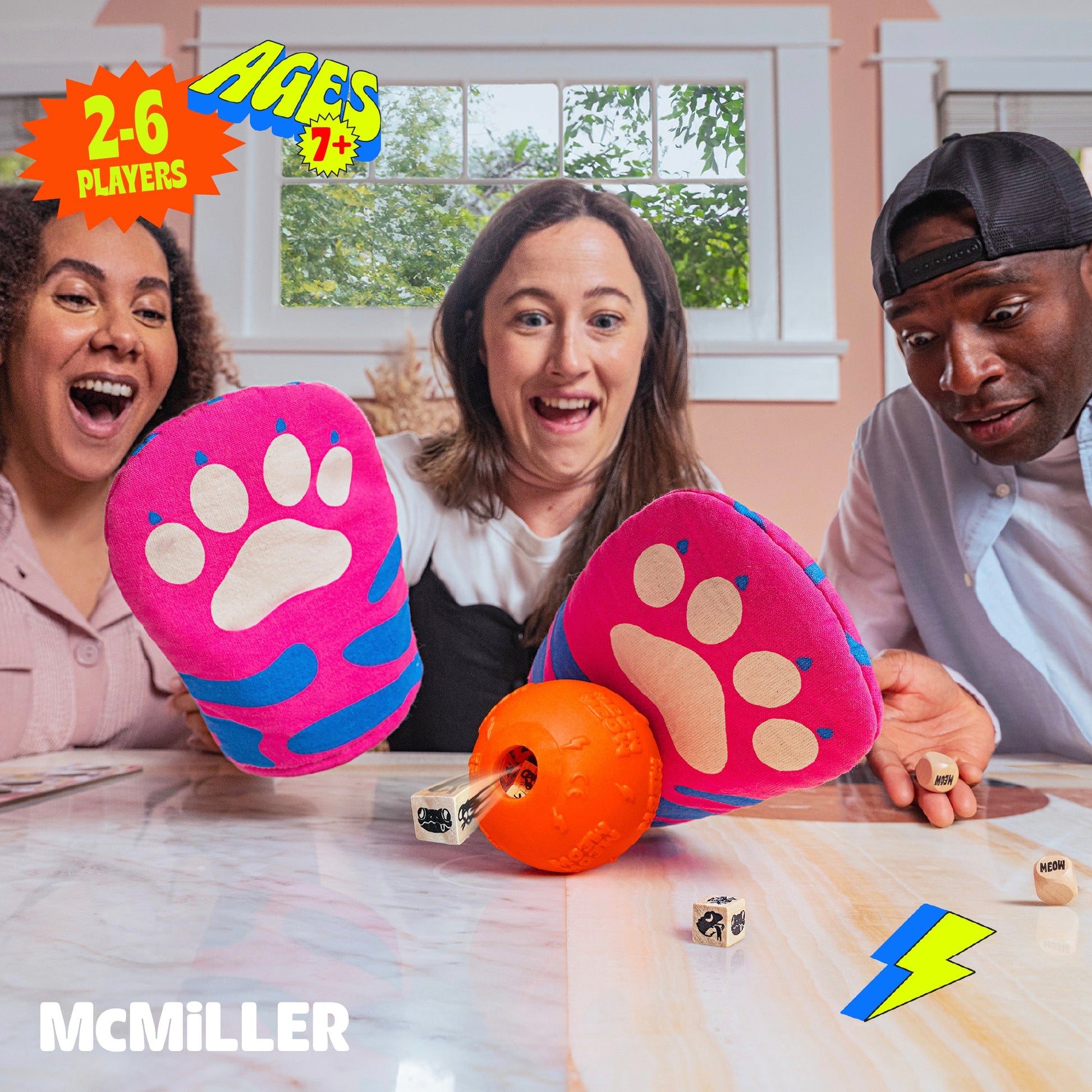 Excited players with pink paw mitts watch a die launch from an orange ball other dice and a lightning bolt are on a table