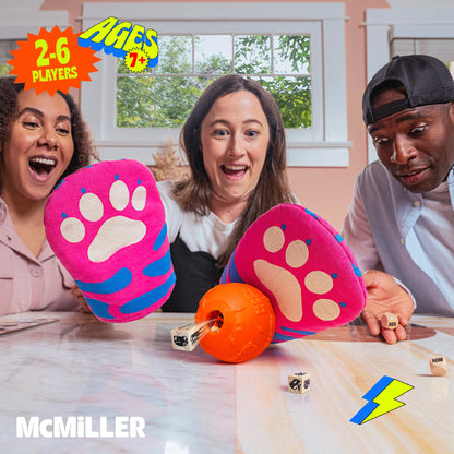 Excited players with pink paw mitts watch a die launch from an orange ball other dice and a lightning bolt are on a table