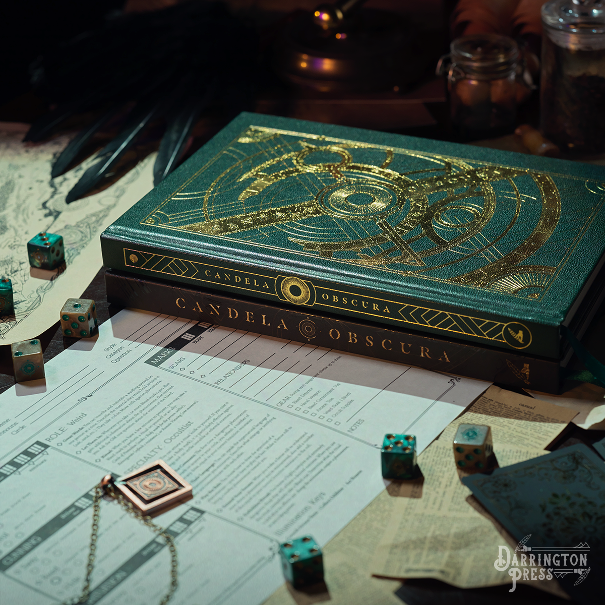 Candela Obscura RPG game setup: stacked rulebooks (top green with gold art), character sheets, dice, and a pendant