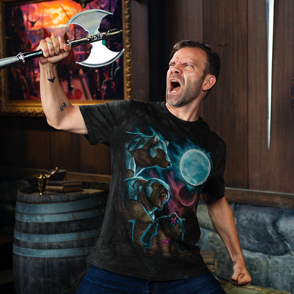 Intense man in a bear-print T-Shirt shouts, raising a double-bladed axe in a fantasy setting