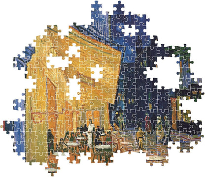 Partially assembled jigsaw puzzle of Van Gogh's 'Café Terrace at Night' with missing pieces