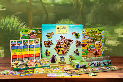 Game components for "Sanctuary: An Ark Nova Game," showing the box, animal tiles, and player boards