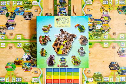 Sanctuary: An Ark Nova Game box, featuring giraffes and diverse wildlife, placed on the hexagonal game board