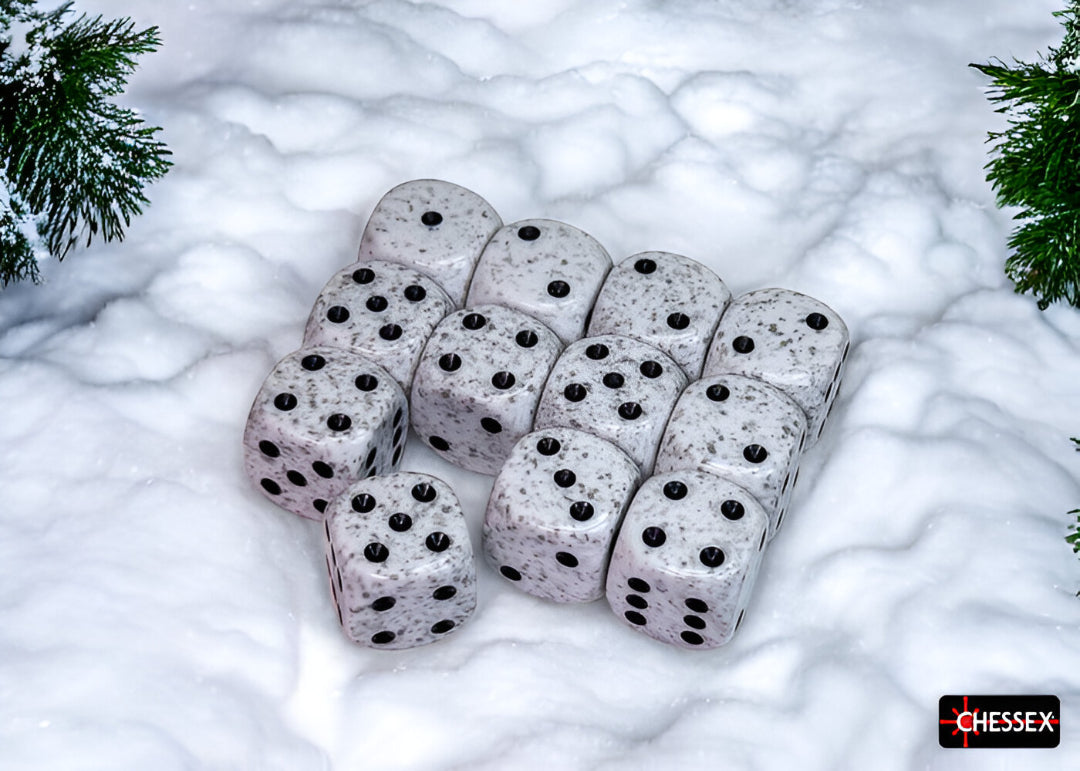 A cluster of white speckled dice with black pips rests on white snow, framed by green pine branches