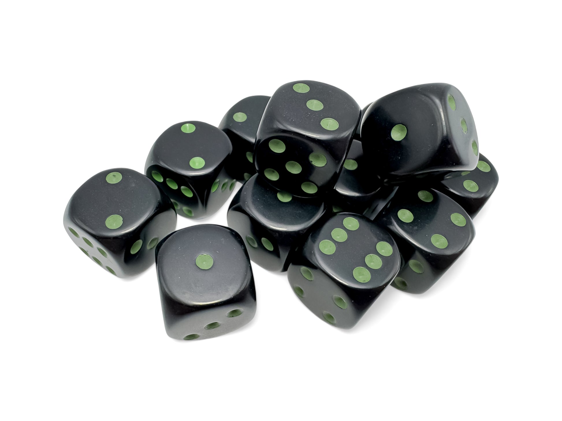 A pile of black dice with green pips on a white background