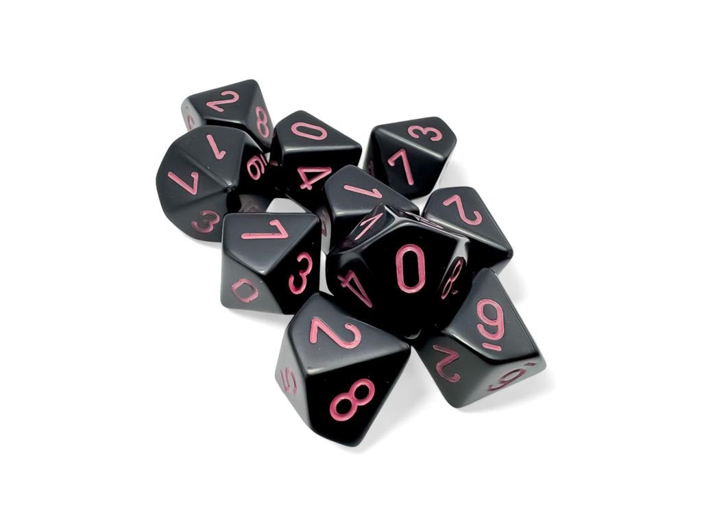 Black 10-sided dice with pink numbers, scattered on a white background