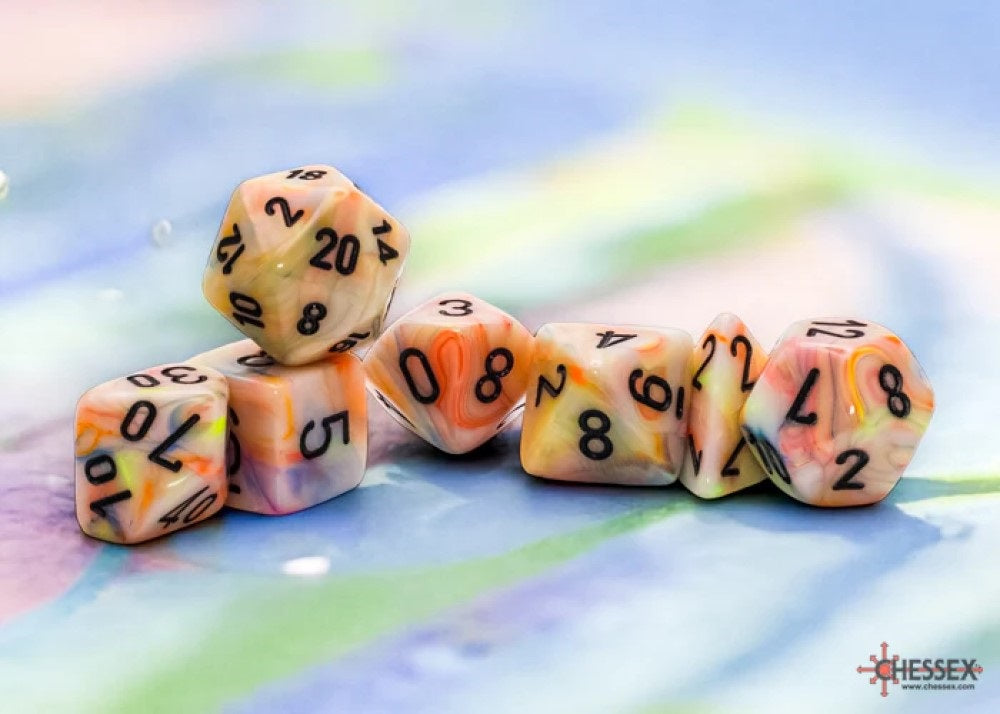 A cluster of swirled orange, yellow and white polyhedral dice with black numbers on a colorful, blurred background