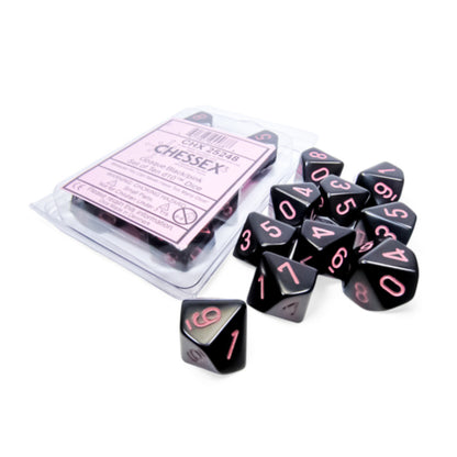 A set of black D10 dice with pink numbers, some scattered and some in clear plastic packaging