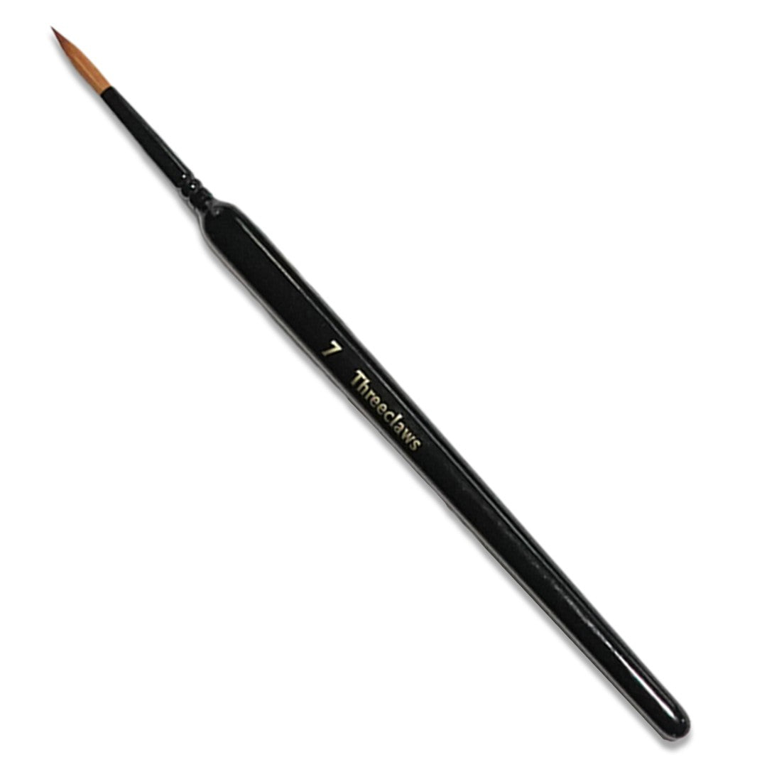 Black fine-tipped paint brush with brown bristles, labeled '7 Threeclaws'