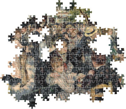 Partially completed jigsaw puzzle of Renoir's "Bal du moulin de la Galette," depicting a joyful outdoor crowd