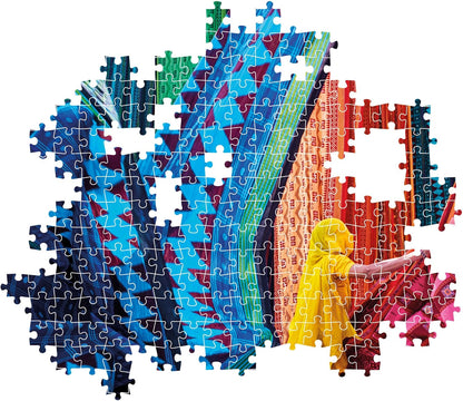 Jigsaw puzzle showing a person in yellow reaching for vibrant, patterned fabrics