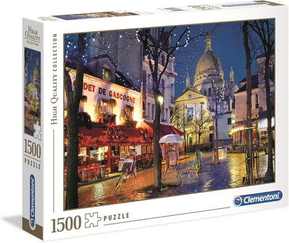 1500-piece puzzle box with a night scene of a Paris street, a lit-up cafe, and an artist's easel