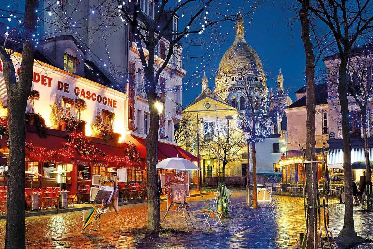Illuminated Montmartre square at night with wet cobblestones reflecting lights from cafes and artist easels, Sacré-Cœur in background