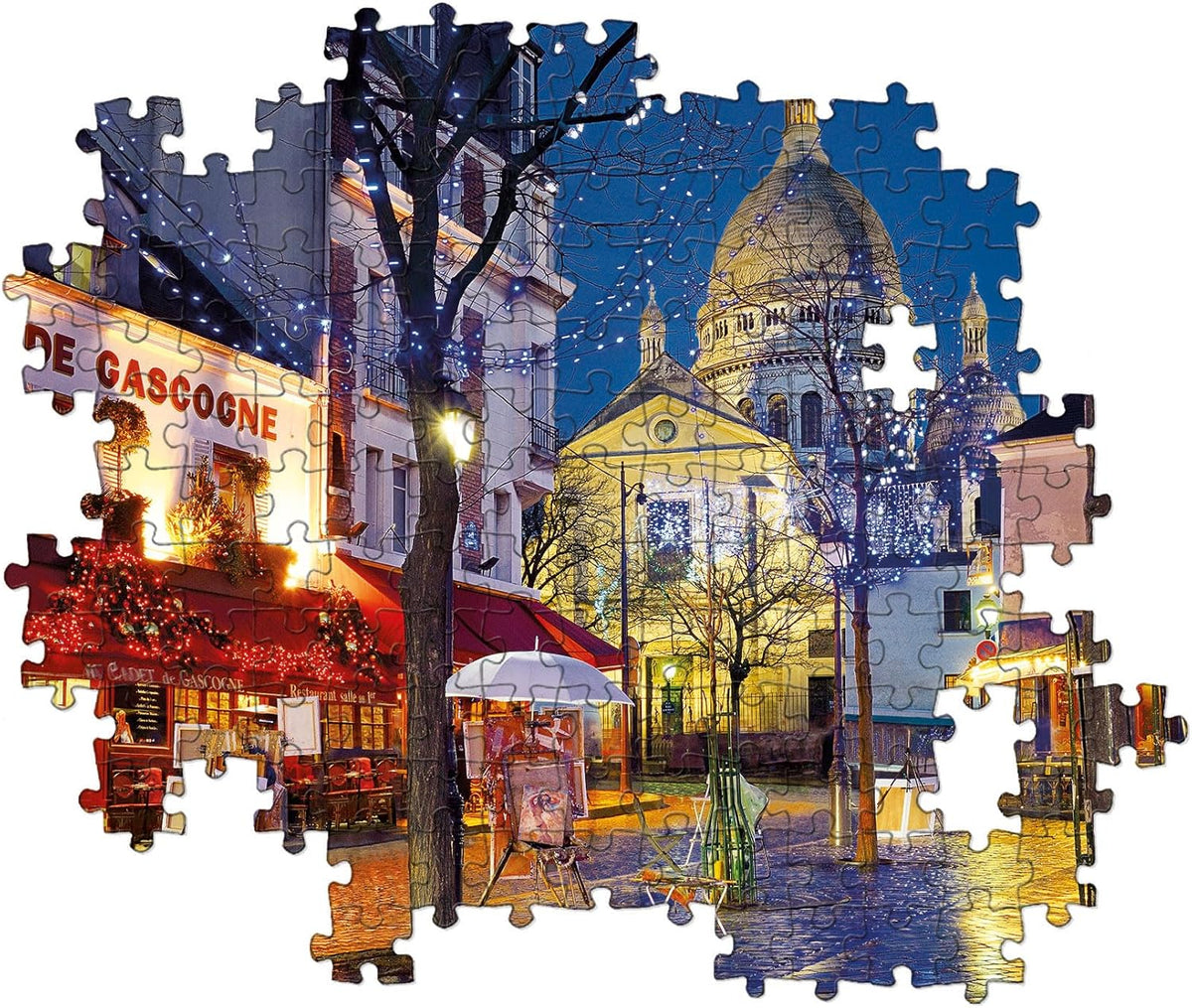Puzzle image: Night scene in Paris with Sacré-Cœur, a cafe, trees with string lights, and reflections on wet ground