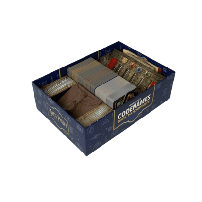 Open Harry Potter Codenames: Back to Hogwarts game box showing neatly organized cards and pieces