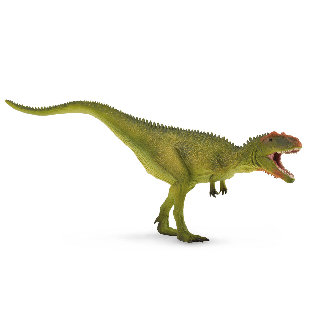 A green Mapusaurus dinosaur toy with a reddish head, open mouth, and long tail stands on a white background