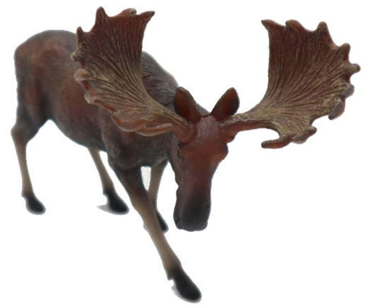 A dark brown moose figurine with large, broad antlers steps forward