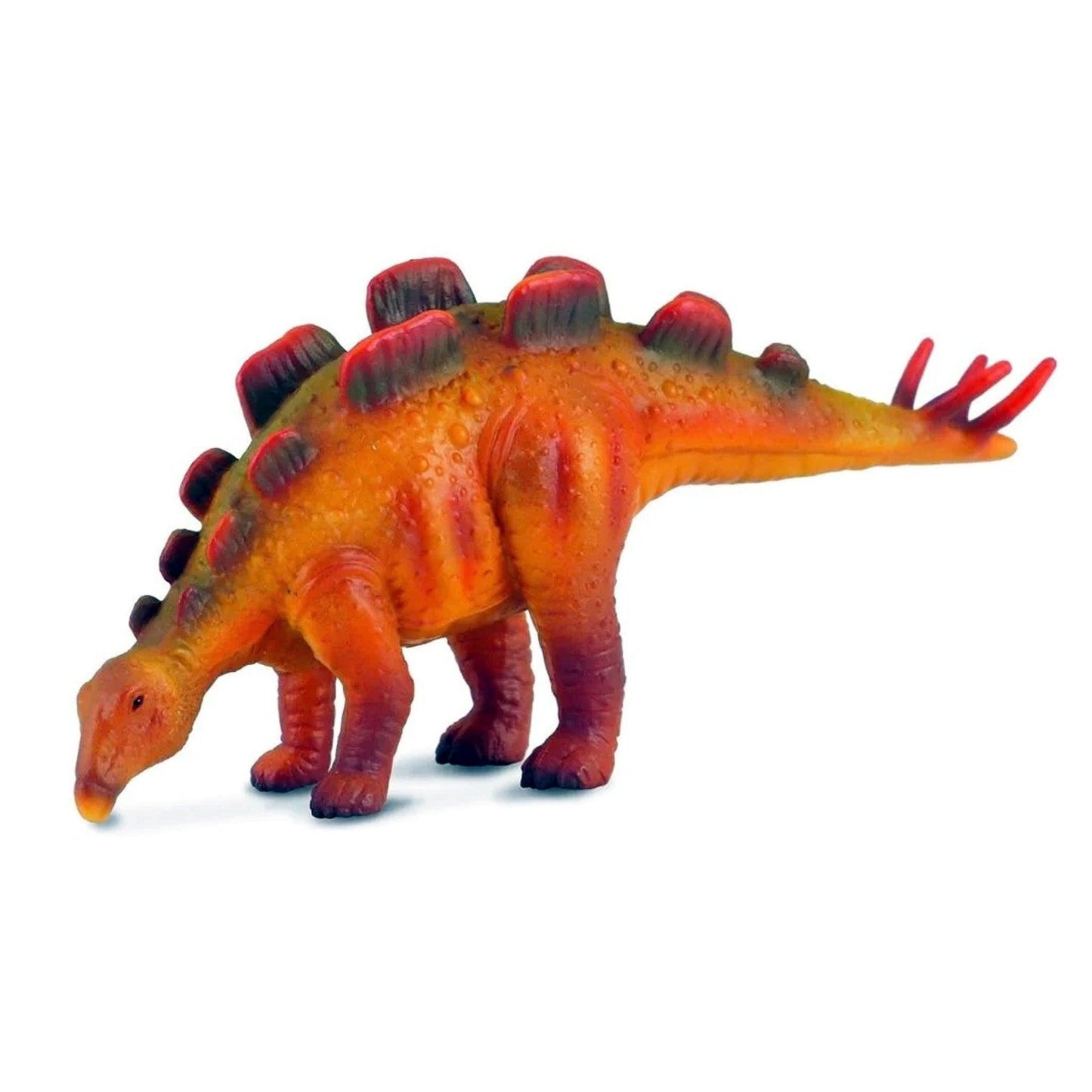 Orange and red Stegosaurus-like dinosaur toy with back plates and tail spikes, its head lowered on a white background
