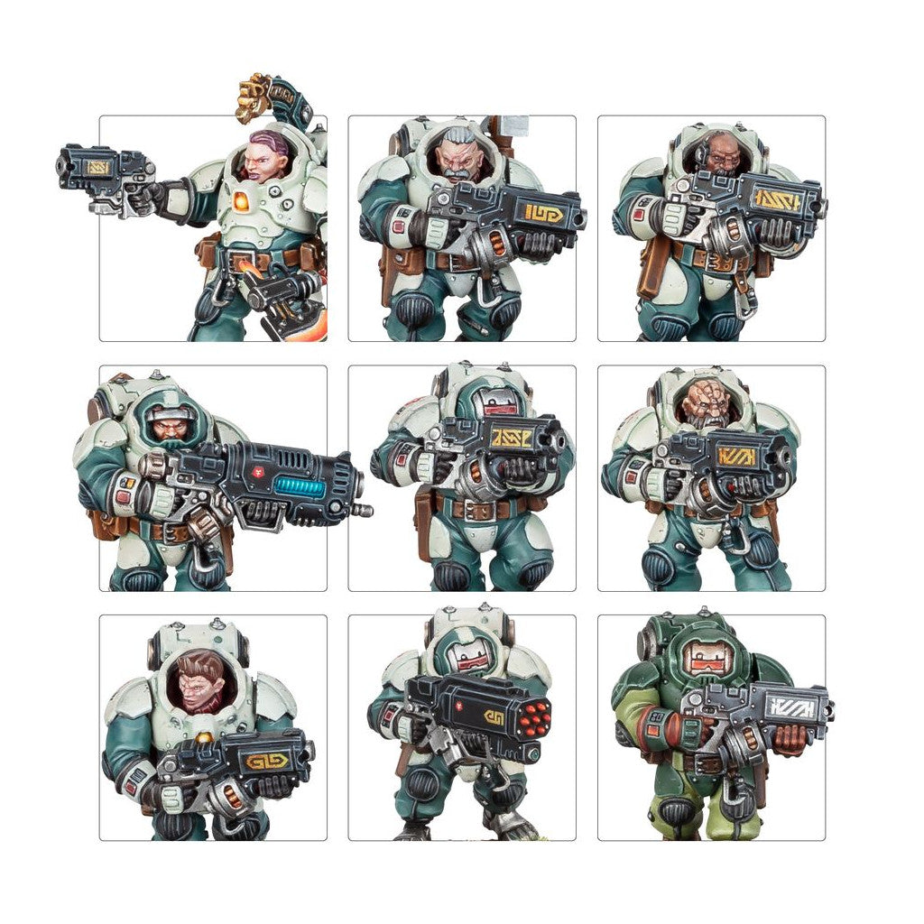 Nine painted sci-fi warrior miniatures in white, grey, and teal armor, armed with futuristic guns